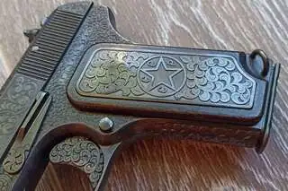 Художественная гравировка пистолета ТТ-СХ: технологии и реализация проекта